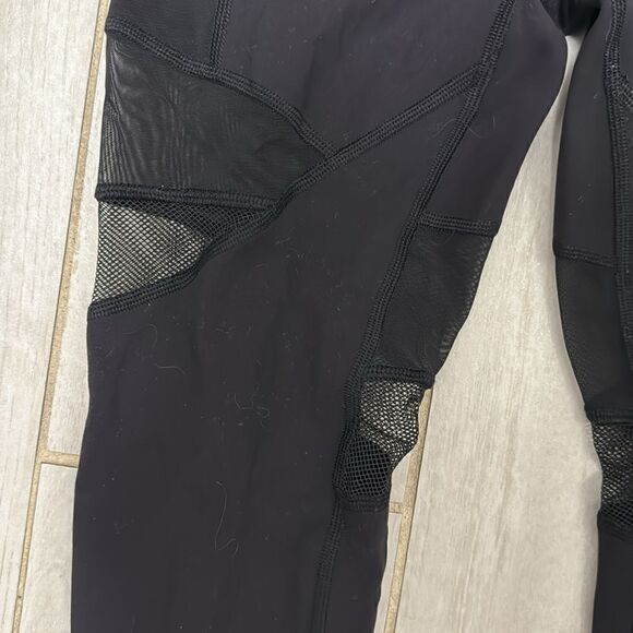 Lululemon 2 black 25” mesh and pocket legging. - Picture 2 of 6